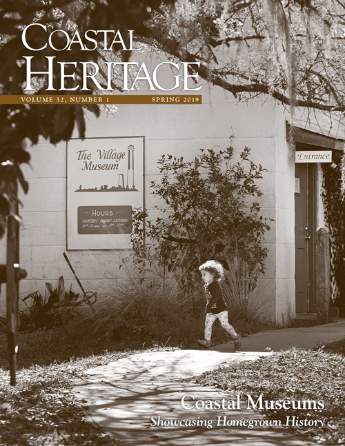 Cover of the Spring 2019 issue showing a child in front of a museum.