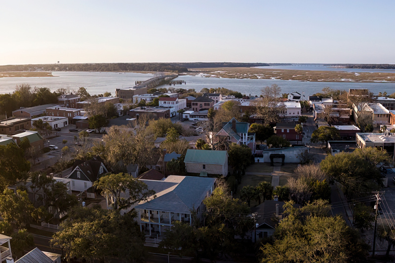 An aerial view of Beaufort, South Carolina showing houses with water in the background.